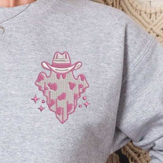 Cowgirl ghost embroidered on cozy crewneck sweater with hat and Halloween western theme