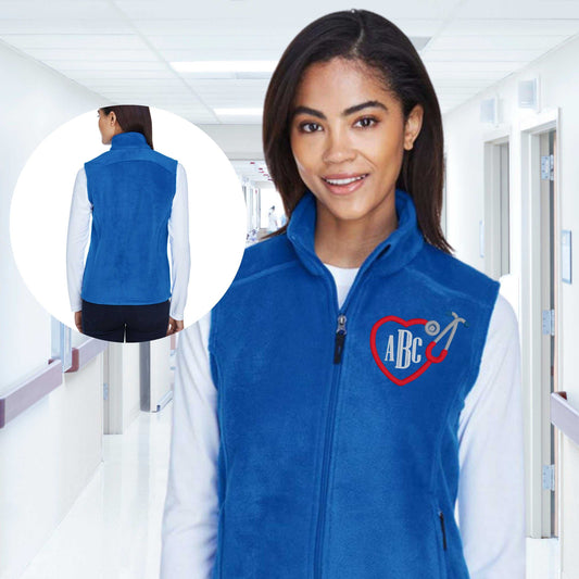 Custom RN embroidered fleece vest, personalized nurse gift, blue unisex design with embroidered initials, cozy and stylish.