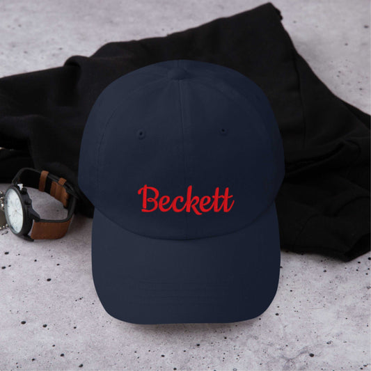 Custom embroidered navy blue personalized cap with red text Beckett, unisex cotton dad hat with adjustable snapback.