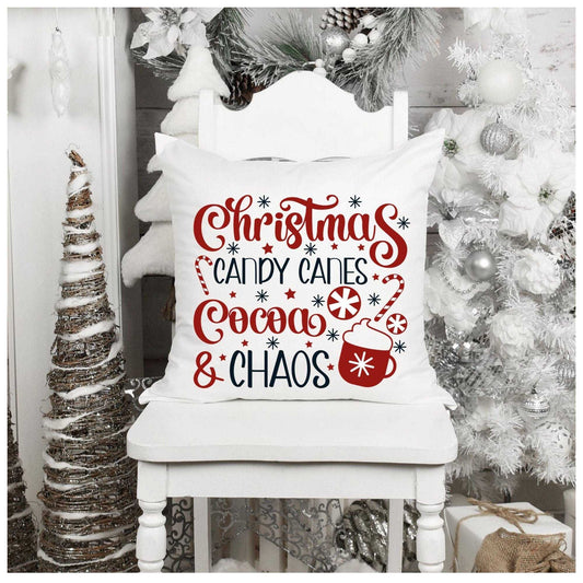 Christmas themed throw pillow with festive design of candy canes and cocoa; perfect for holiday home decor.