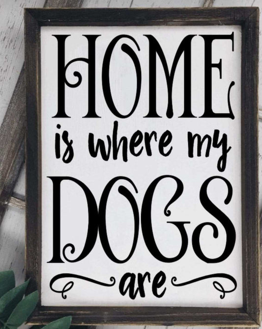 Handmade wood sign with "Home is where the Dog is" message, white background, black lettering.
