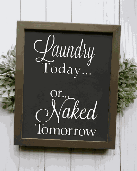 Wood-framed sign with "Laundry Today or Naked Tomorrow" text on a black background.
