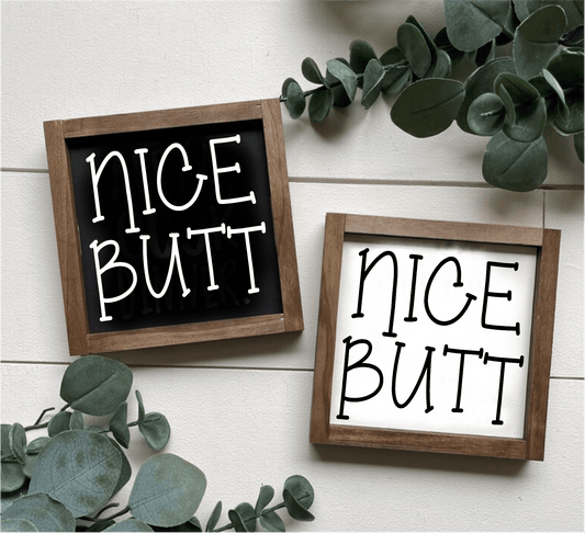 Handcrafted "Nice Butt" wood signs with black and white backgrounds, framed and uniquely designed for bathroom decor.