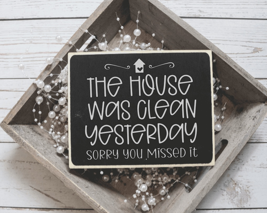 Handmade wood sign with "The House was Clean Yesterday" quote, black background, rustic decor.
