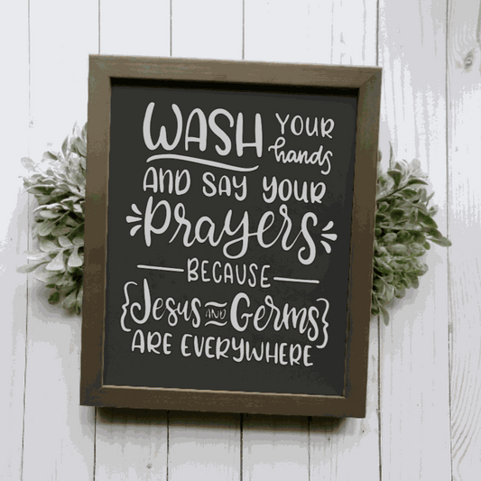 Framed wood sign with "Wash Your Hands and Say Your Prayers" message, black lettering on white background, customizable stain, for bathroom decor.