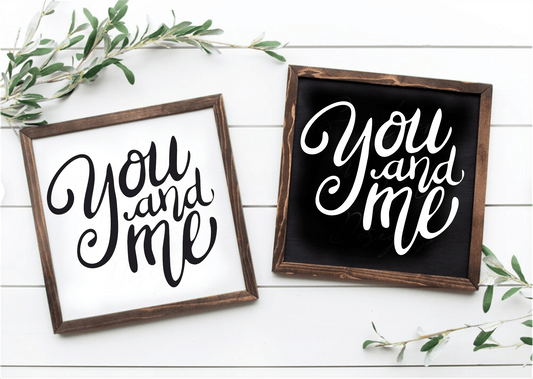 Handmade "You and Me" inspirational wood signs in black and white frames with unique natural variations.