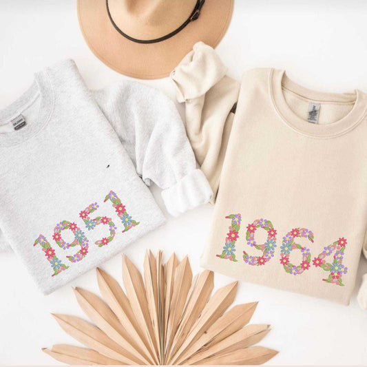 Embroidered floral number sweatshirt personalized with birthday year for milestone celebrations