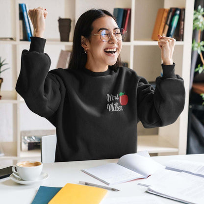 Personalized teacher sweatshirt with embroidered apple and custom name embroidery