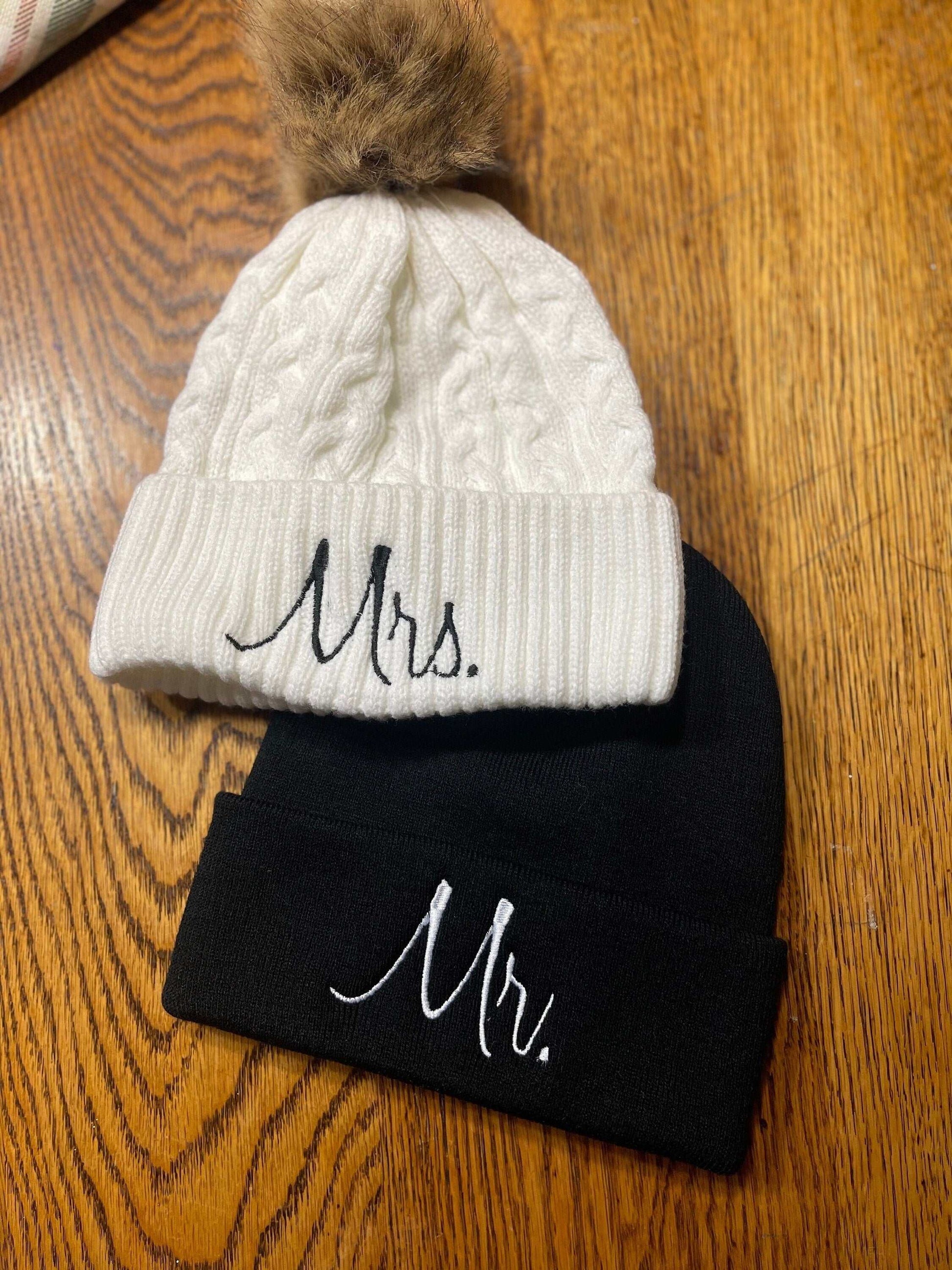 Personalized embroidered beanie with custom name embroidery in vibrant thread colors on a cozy winter hat