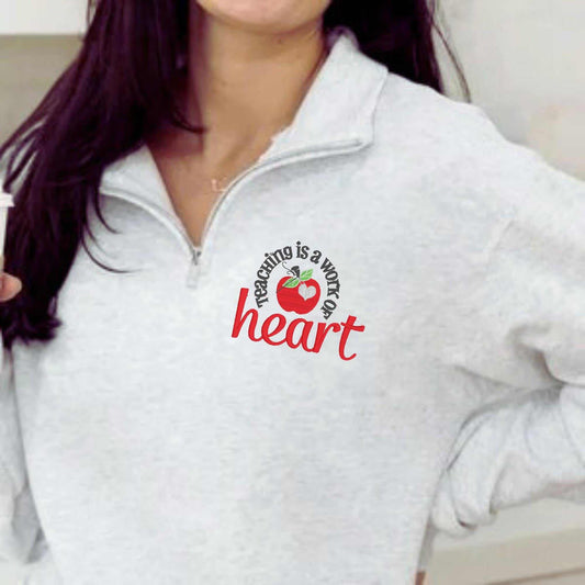 Teaching Is a Work of Heart embroidered sweatshirt with red apple design for teacher appreciation gift