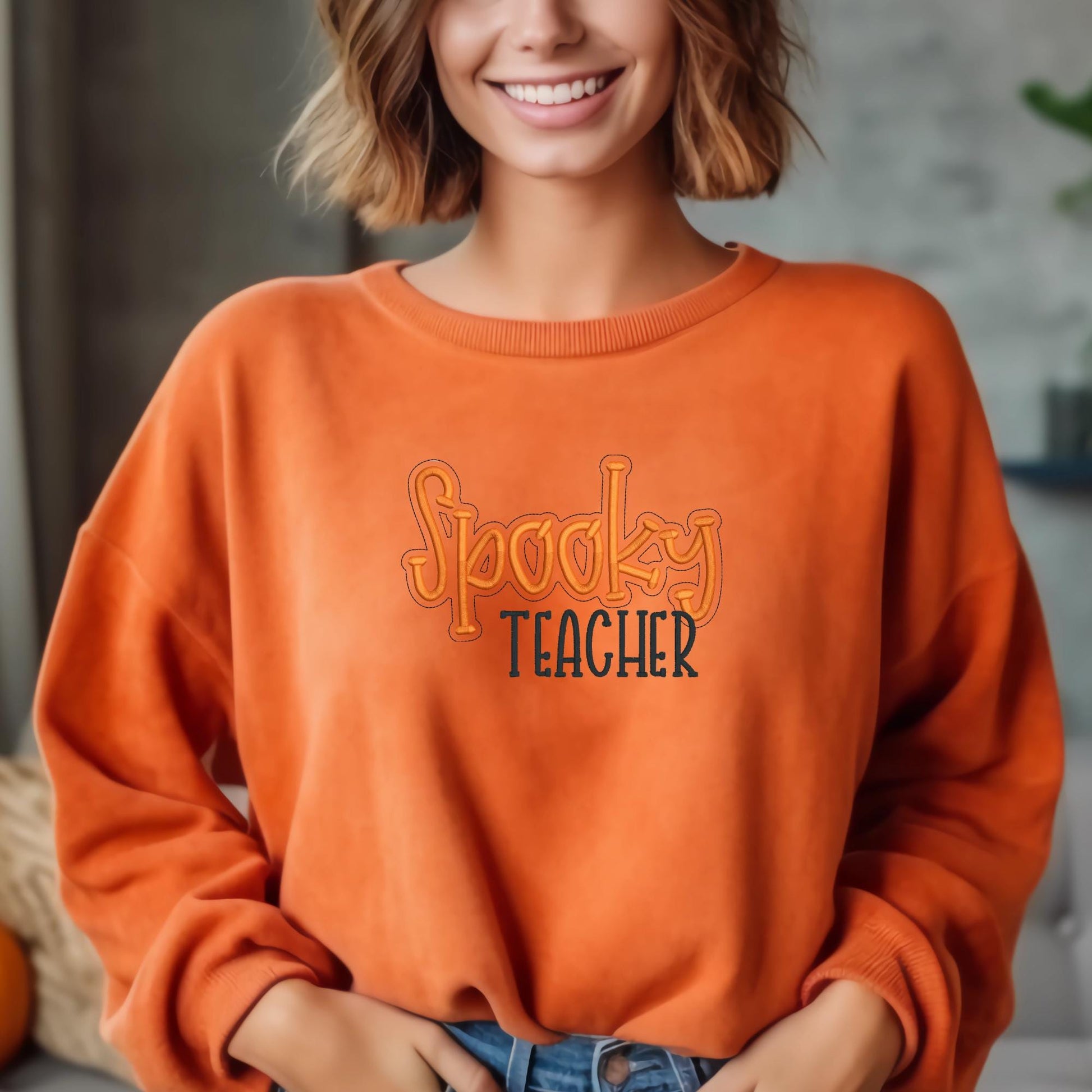 Spooky Teacher embroidered sweatshirt with Halloween design for teachers