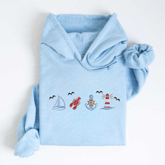 Embroidered coastal sweatshirt with nautical summer design featuring ocean life and vintage boat elements.