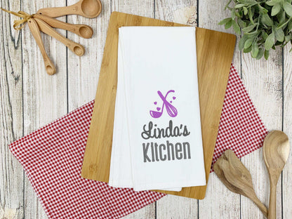 Personalized kitchen towel with embroidered whisk, spoon, hearts, and custom name in chosen thread color