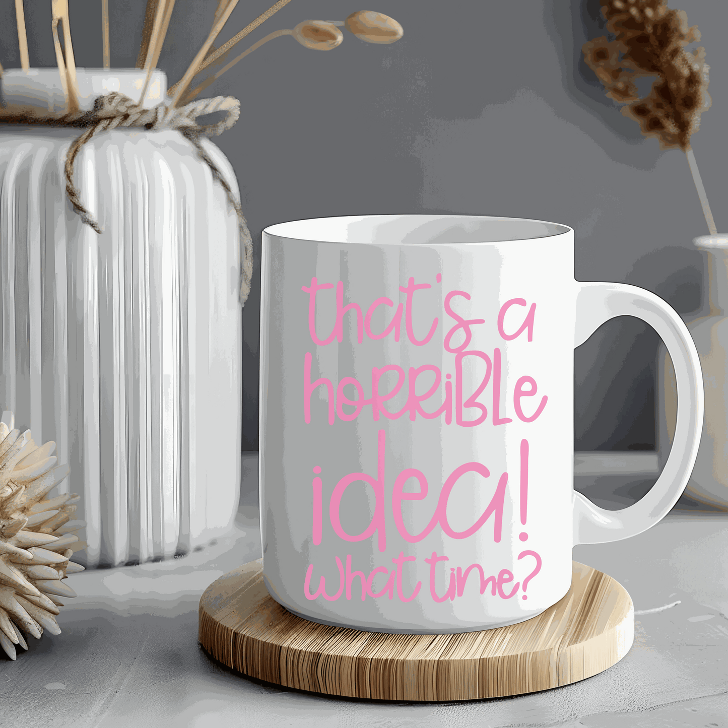 Funny ceramic mug with "That's a Horrible Idea, What Time?" text design, perfect for gifting.