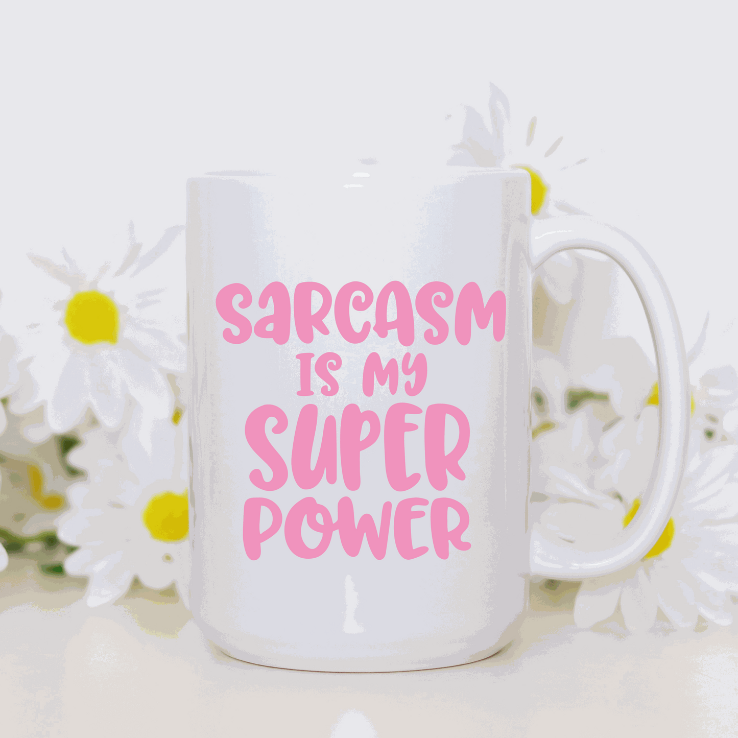 Humorous "Sarcasm is My Super Power" ceramic mug, white and glossy, 11 oz capacity.