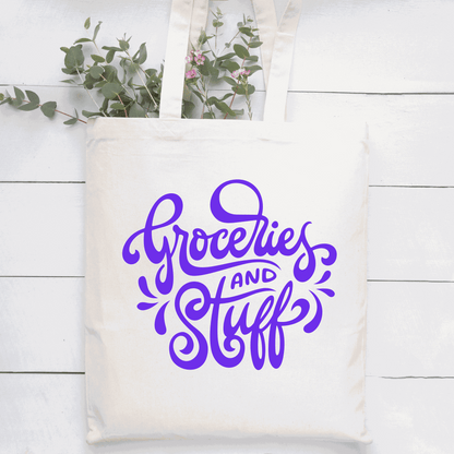 Cotton canvas tote bag with "Groceries and Stuff" design in purple, reusable and environmentally friendly.