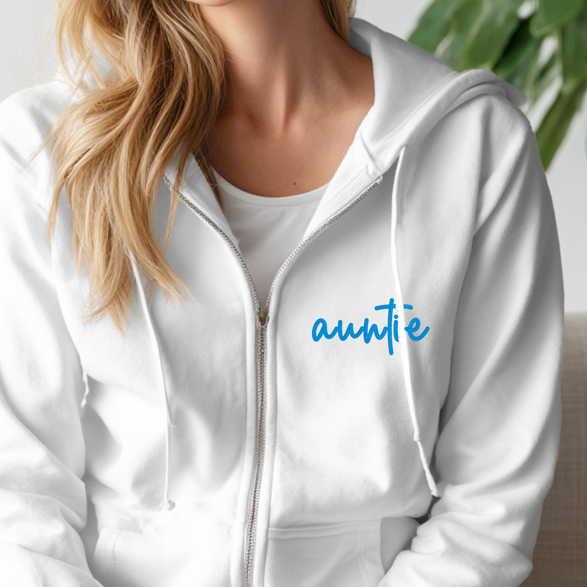 Custom embroidered zip-up hoodie with personalized name on sleeve in various colors