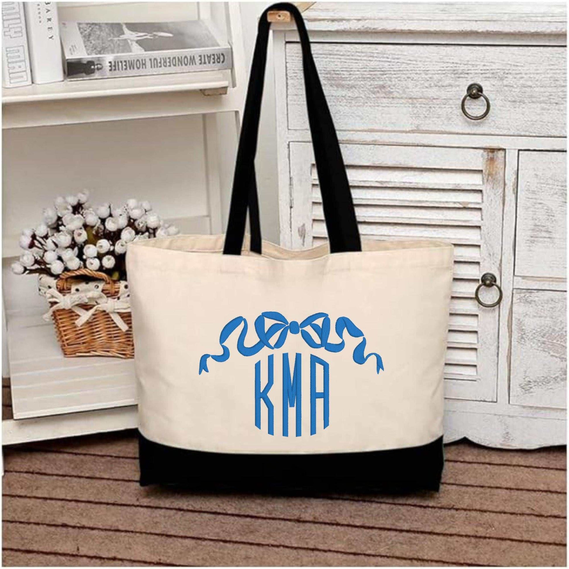 Monogrammed bow embroidered navy canvas tote bag with cotton handles