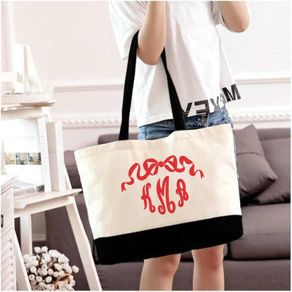 Monogrammed bow embroidered navy canvas tote bag with cotton handles