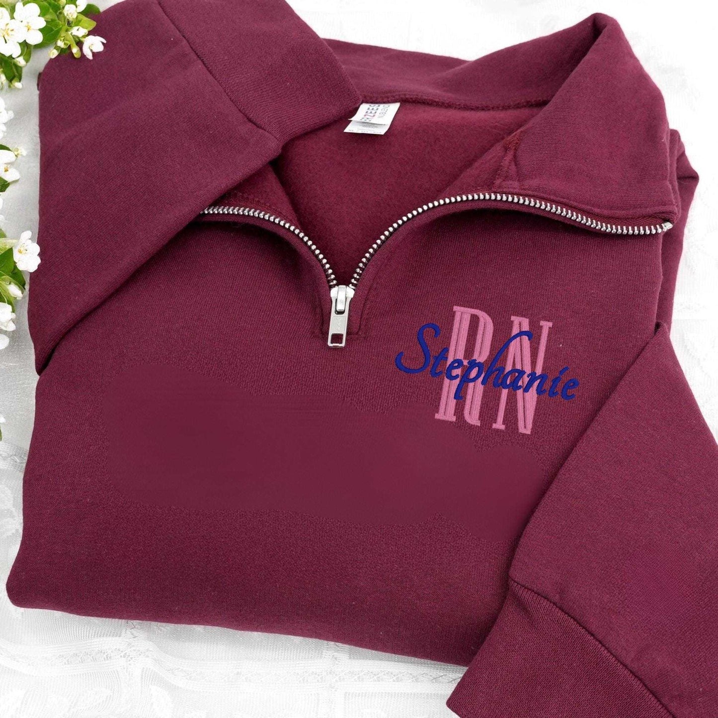 Embroidered nurse quarter zip sweatshirt personalized with name and position in soft cotton-polyester blend