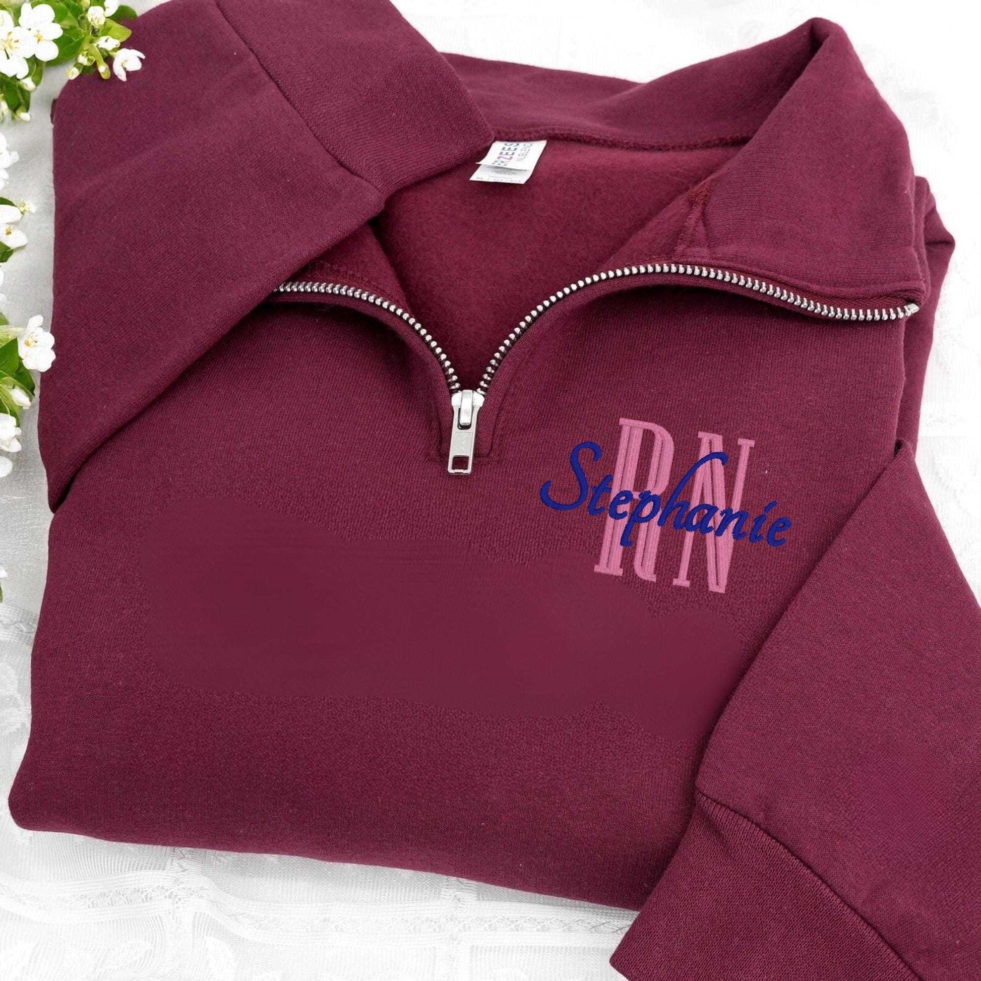 Embroidered nurse quarter zip sweatshirt personalized with name and position in soft cotton-polyester blend