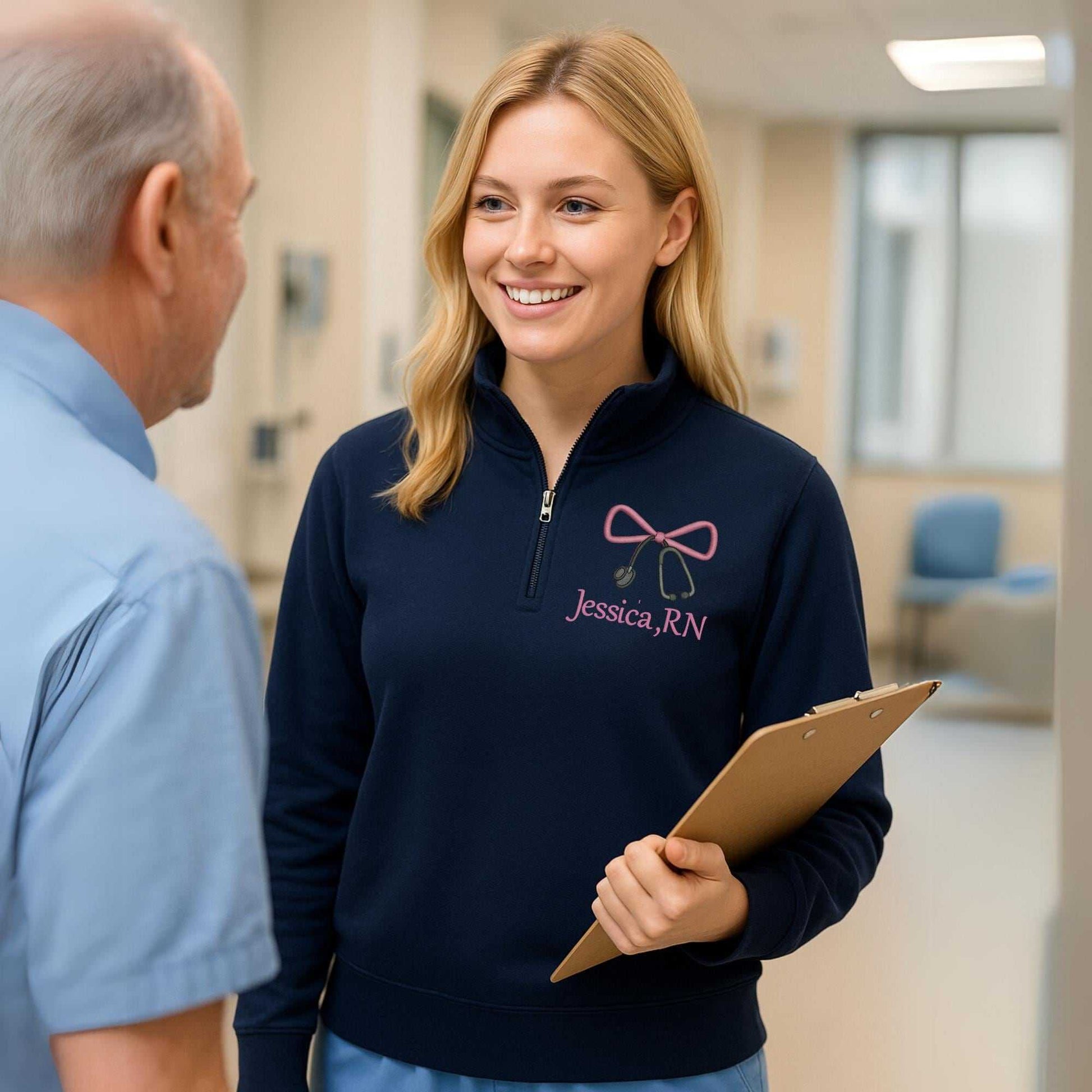 Embroidered Nurse Bow Sweatshirt personalized with name on ash-colored quarter zip pullover for nurse appreciation gifts
