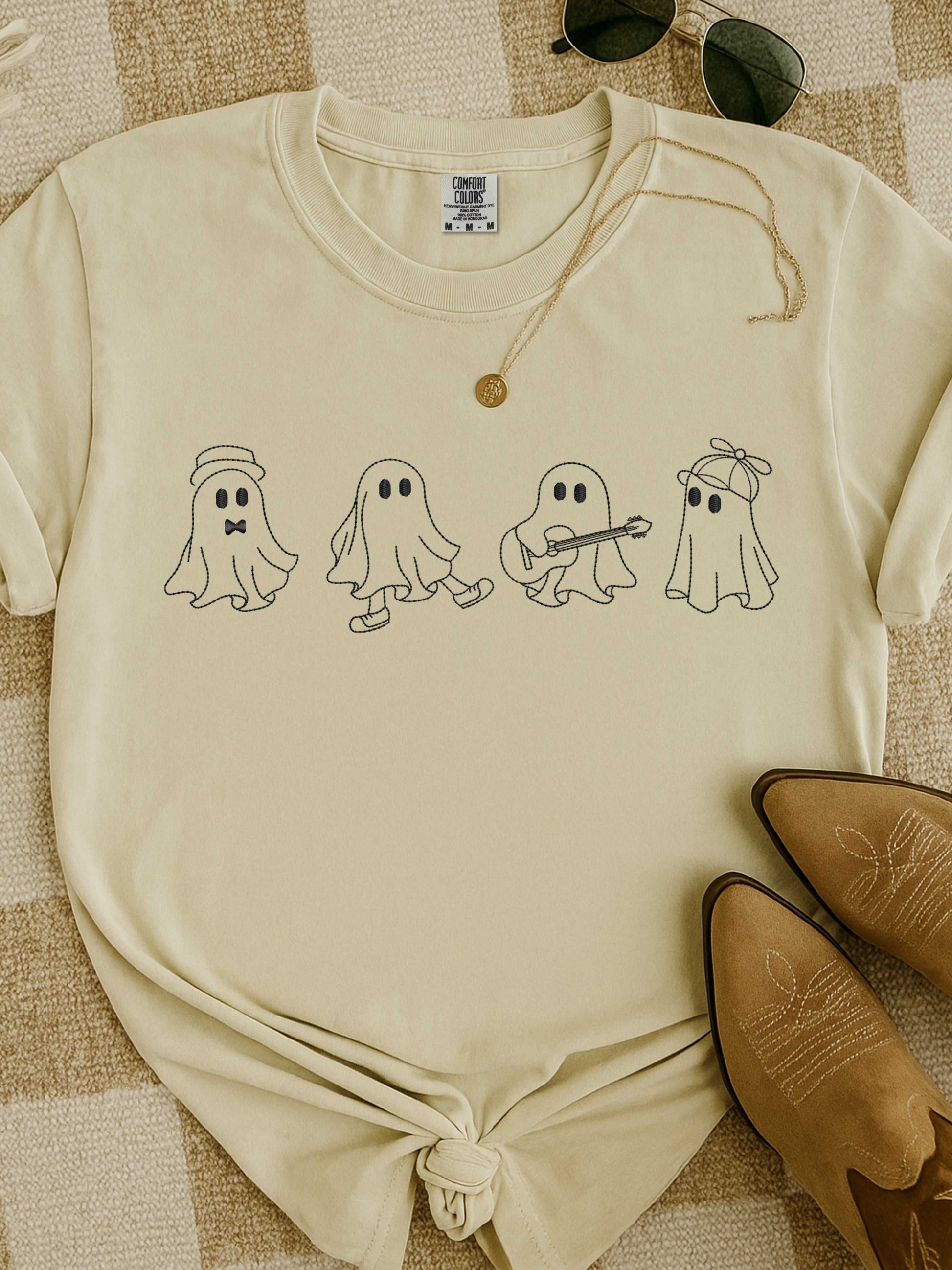 cream t-shirt with embroidered playful ghost designs and fall accessories