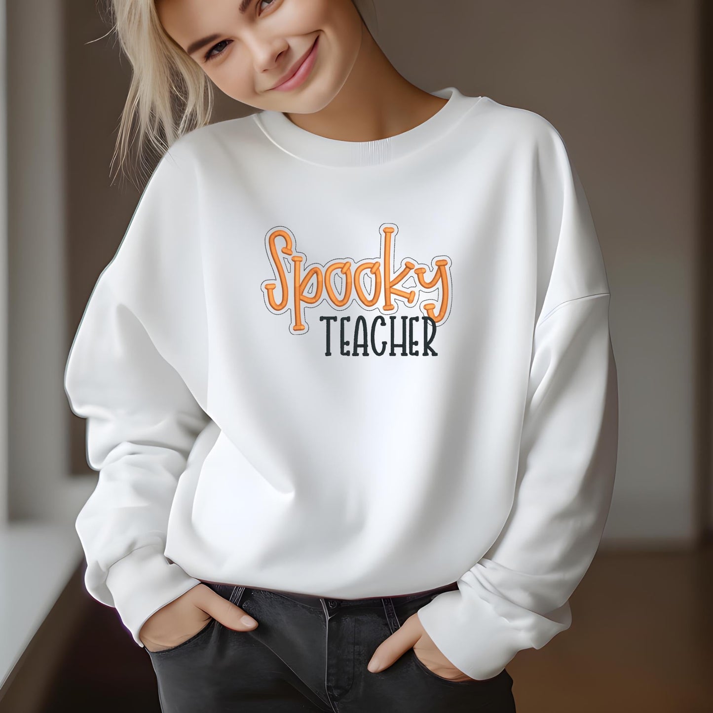 Spooky Teacher embroidered sweatshirt with Halloween design for educators