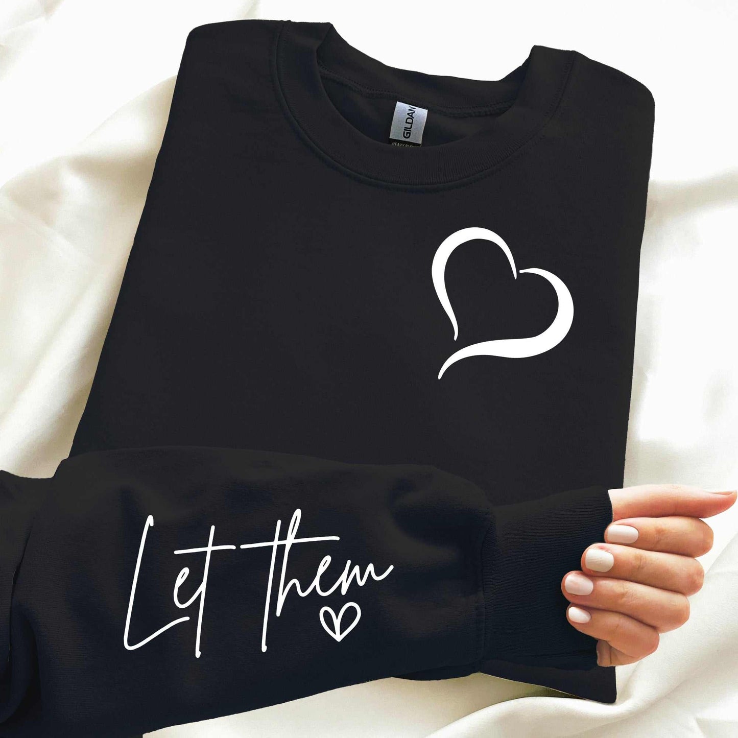 "Let Them Embroidered Cozy Sweatshirt" with heart detail and affirmation text; ideal for emotional wellness and personal growth.