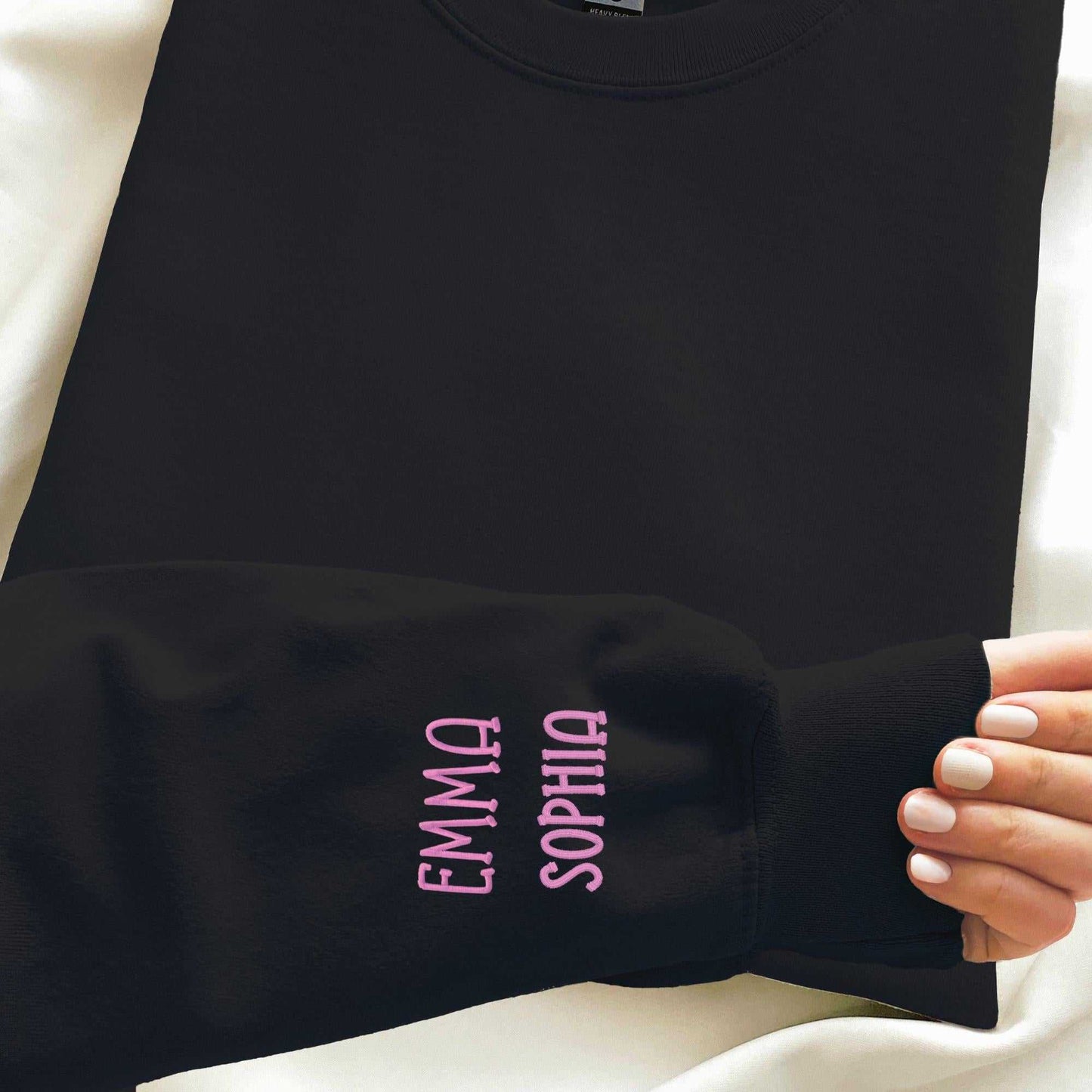 Custom embroidered zip-up hoodie with personalized name on sleeve in various colors