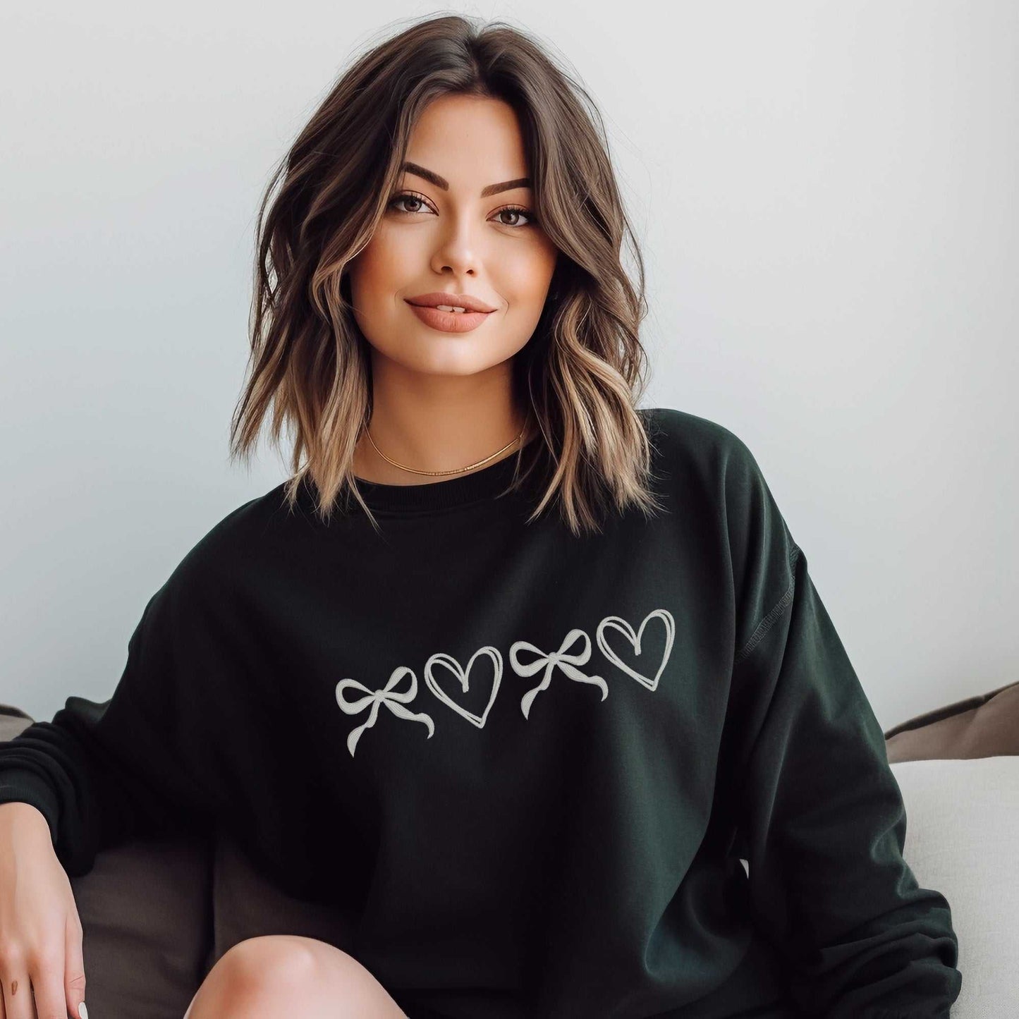 Custom coquette bow and heart embroidered sweatshirt, soft Gildan fabric, perfect gift for women.