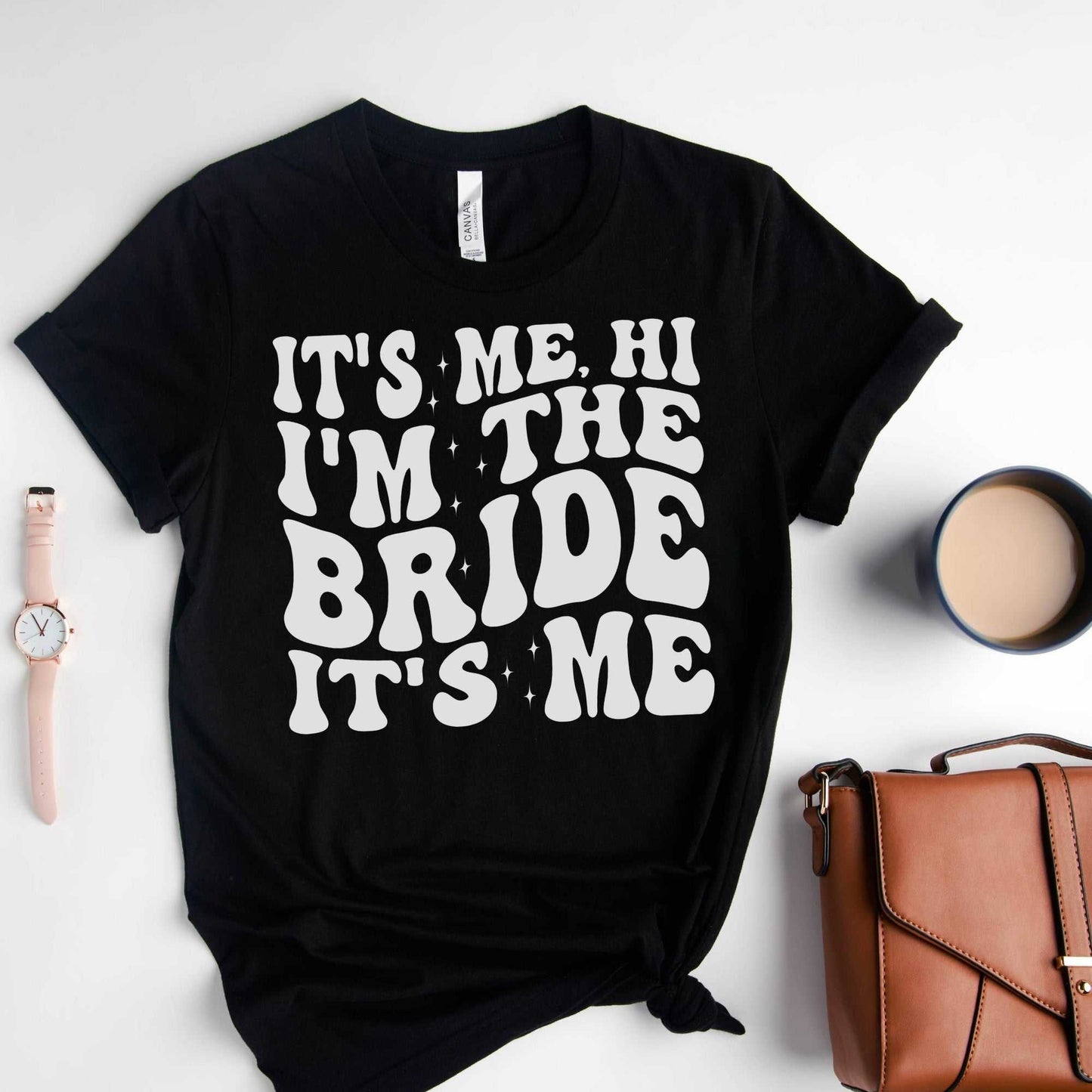 Custom bachelorette party shirt for brides-to-be with "It's Me, Hi I'm the Bride" text, perfect for events and bridal celebrations.
