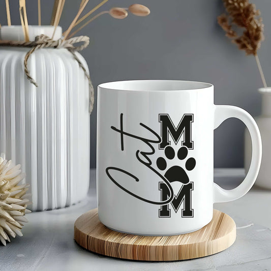 Cat Mom Mug with paw print and varsity-style lettering, ceramic, 11oz or 15oz.