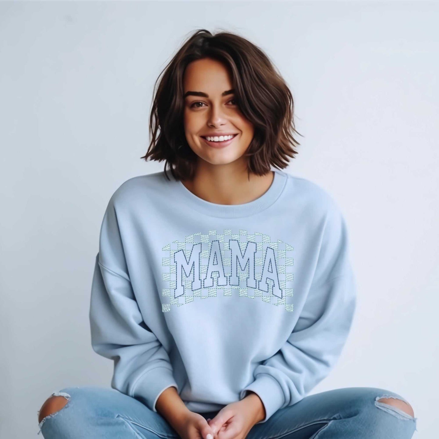 Cozy embroidered “MAMA” sweatshirt with personalized sleeve names, perfect for new moms and Mother’s Day gifts.