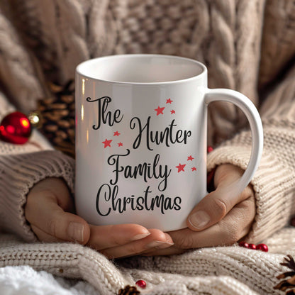 Custom Name Christmas Mug with family name and red stars, white enamel, 15oz, dishwasher and microwave safe