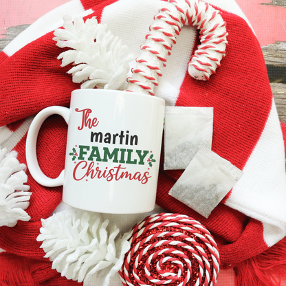 Custom family Christmas mug with personalized family name in festive design, 15oz white enamel, dishwasher and microwave safe