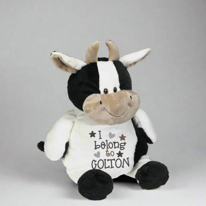 Custom personalized stuffed cow with embroidered "I Belong to" design, baby gift.