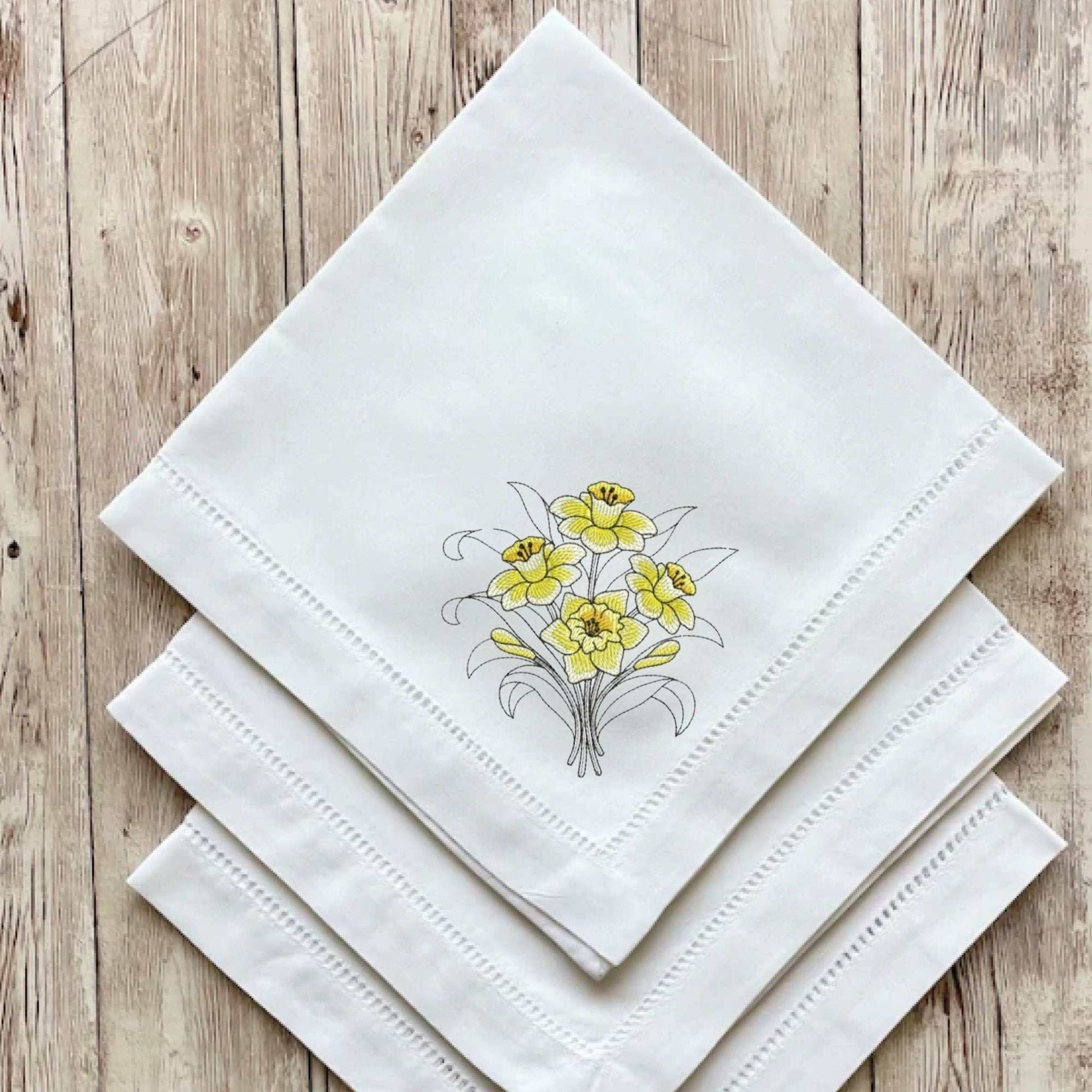 Reusable cloth napkin with nature-themed botanical design, cream white linen blend, 20x20 inches.