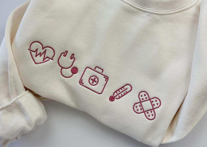 Embroidered Varsity Nurse Icon Quarter Zip Sweatshirt