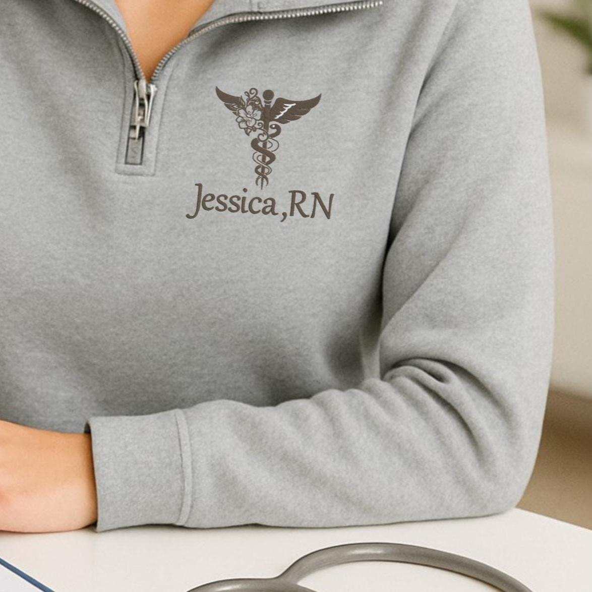 Nurse embroidered quarter zip sweatshirt with custom name and medical symbol