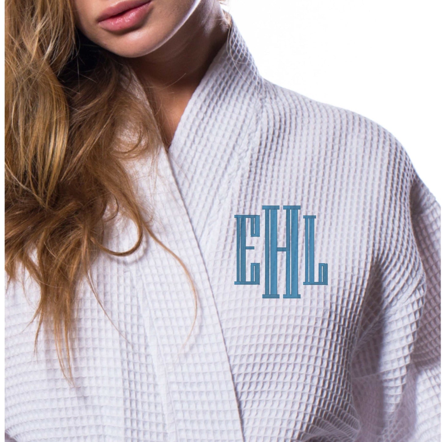 Personalized white waffle spa robe with blue embroidered initials for bridal parties