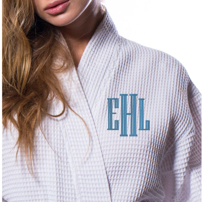 Personalized white waffle spa robe with blue embroidered initials for bridal parties