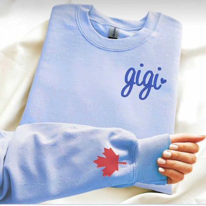 Personalized Mama Sweatshirt with embroidered kids' names on sleeves, customizable thread color and font.