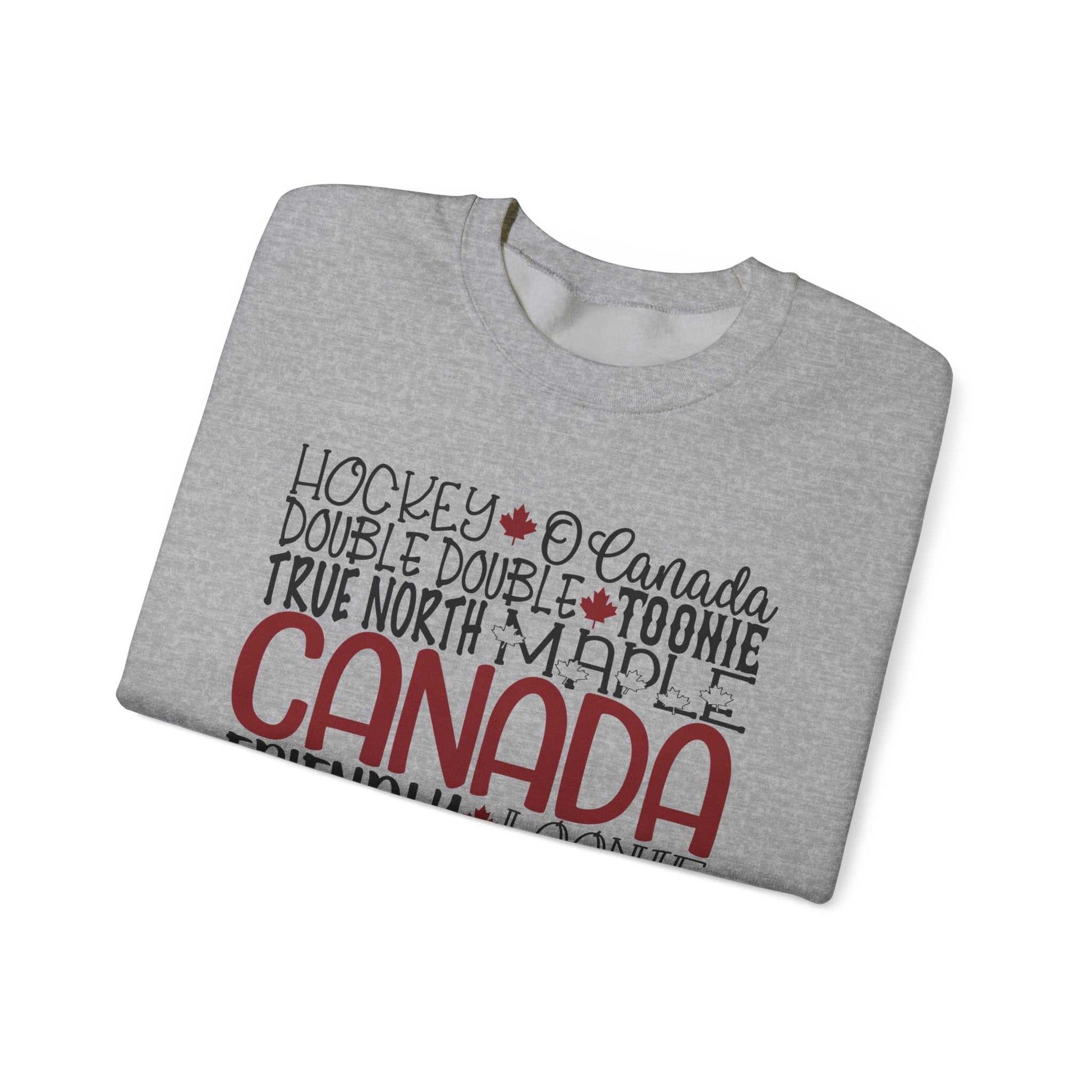 Cozy unisex Canada word art fleece sweatshirt featuring patriotic collage, ideal for Canadians and tourists.