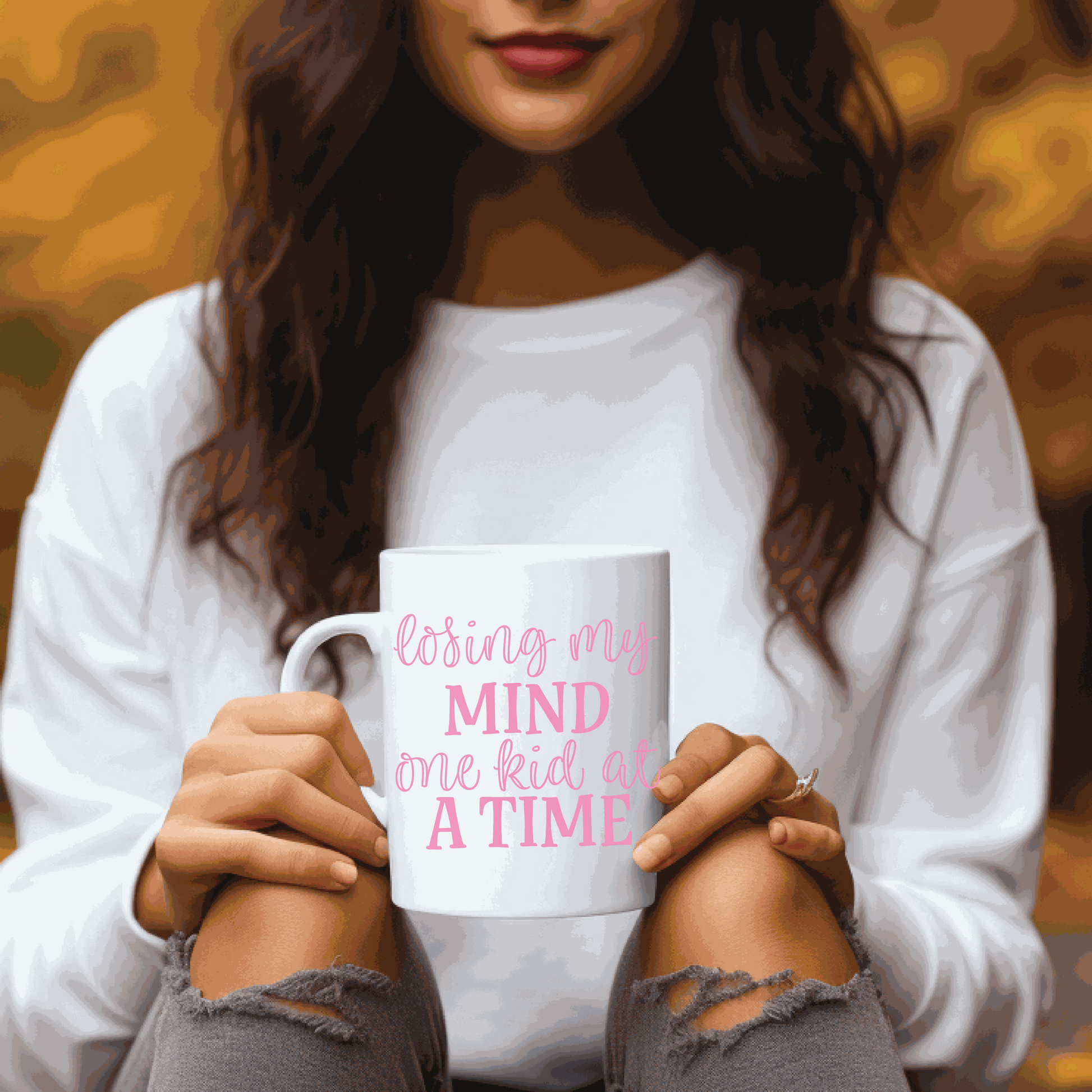 Ceramic mug with "Losing my Mind one Kid at a Time" design, perfect for moms.