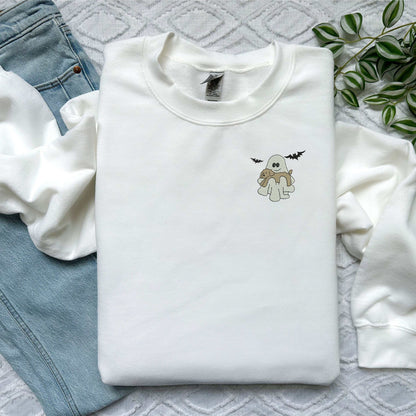 Halloween ghost and dog embroidered crewneck sweatshirt on display.