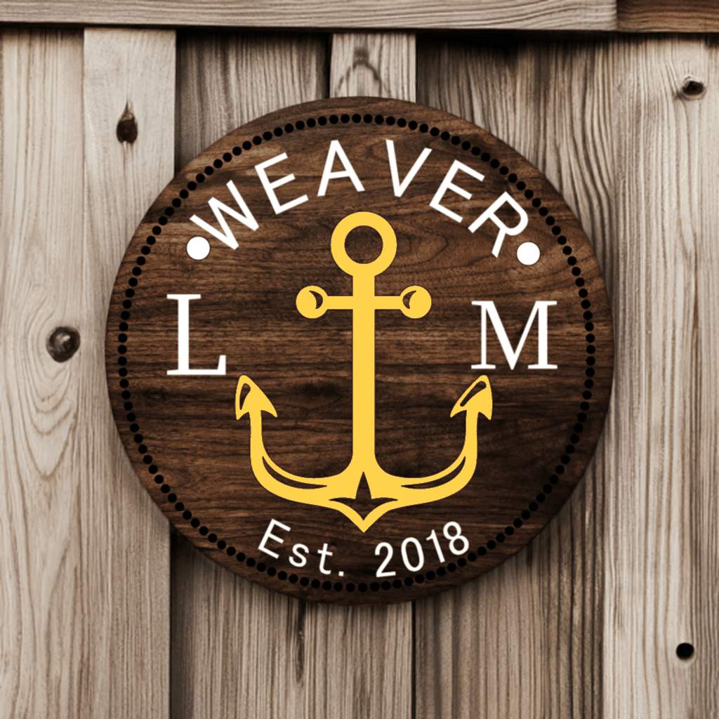 Custom family wood door sign with anchor design, featuring personalized last name and year, handcrafted from solid pine.