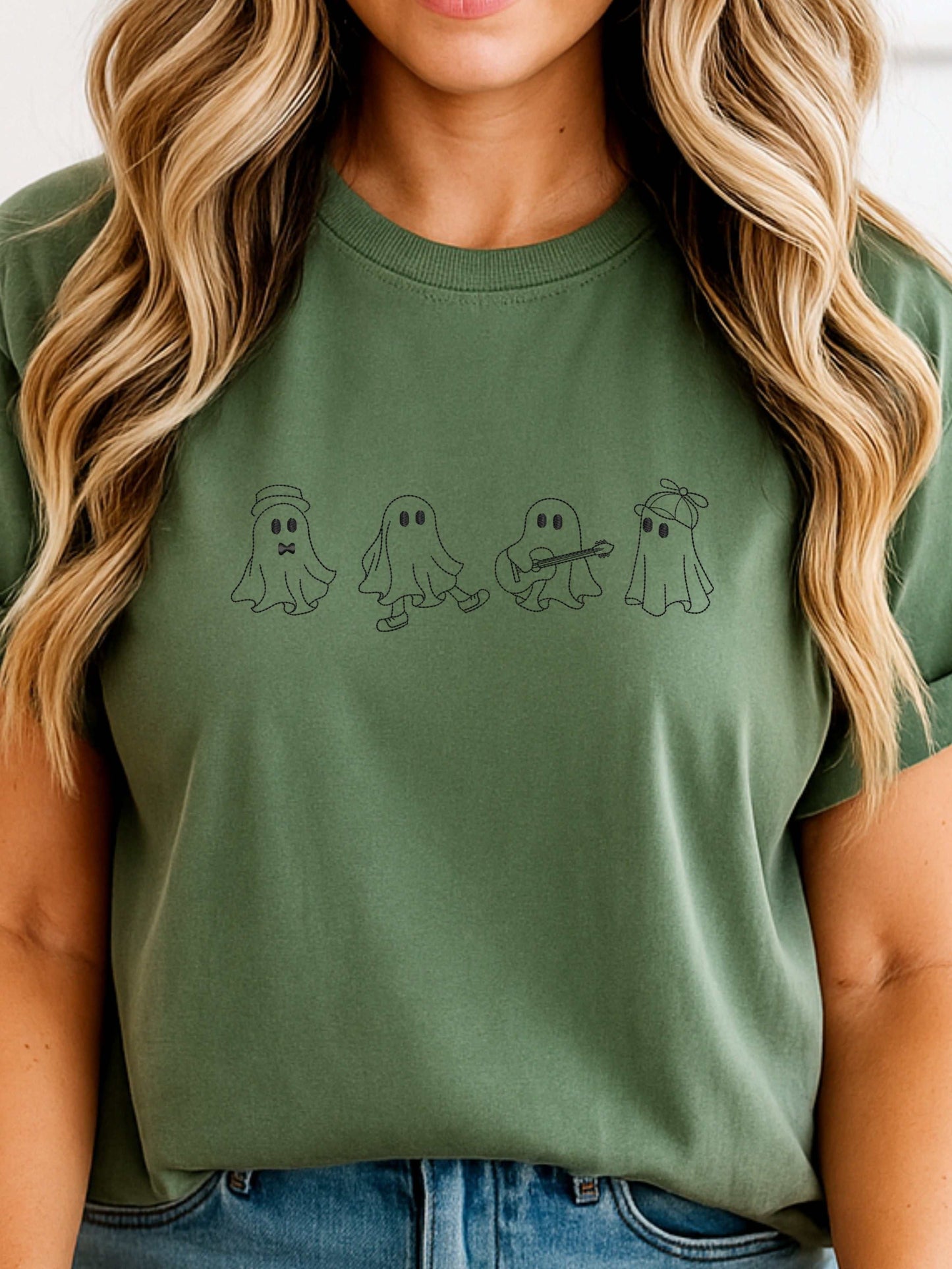 Green t-shirt with four cute embroidered ghost designs for Halloween and fall