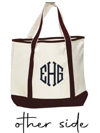Personalized embroidered tote bag with monogram, long handles, and eco-friendly canvas.