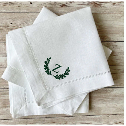 White linen blend dinner napkin embroidered with initial Z and decorative hemstitch edges